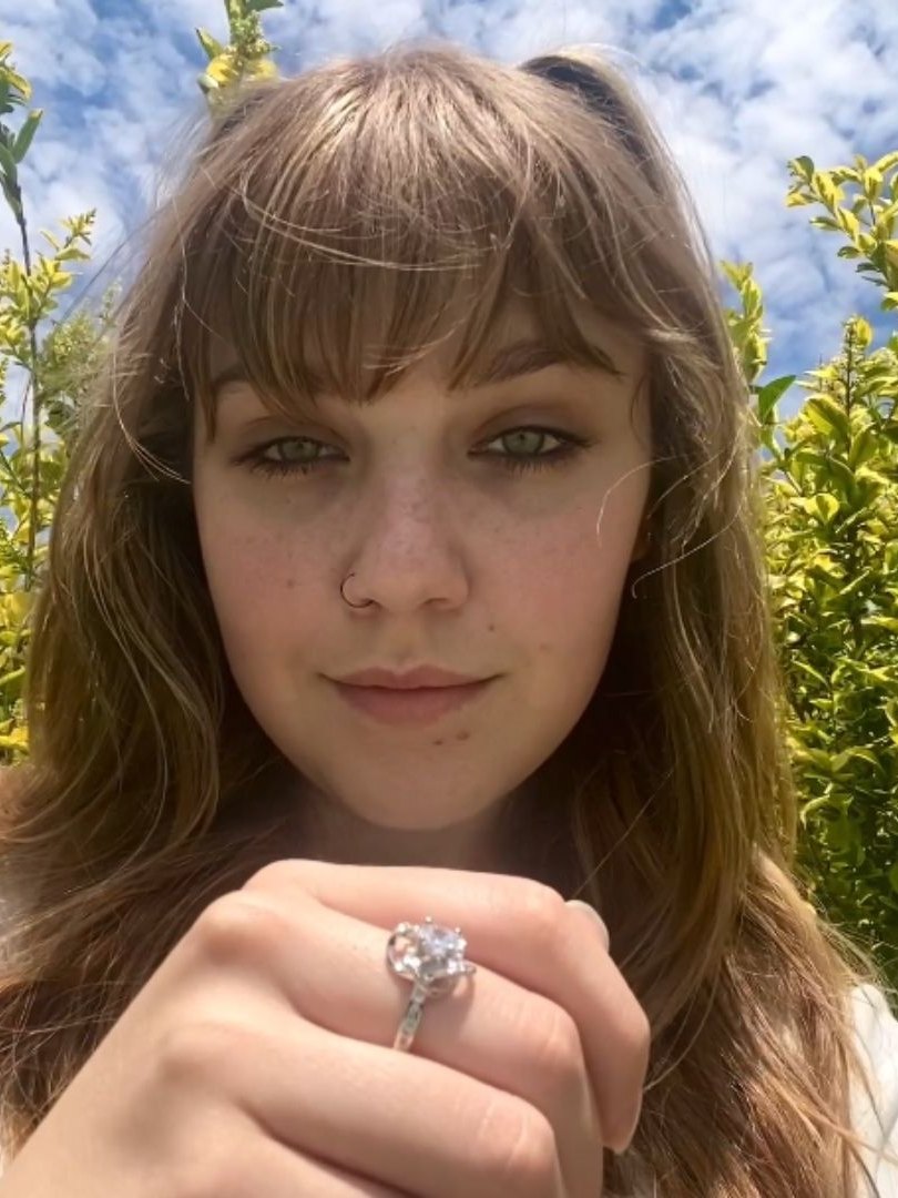 The knot ring held up to the camera