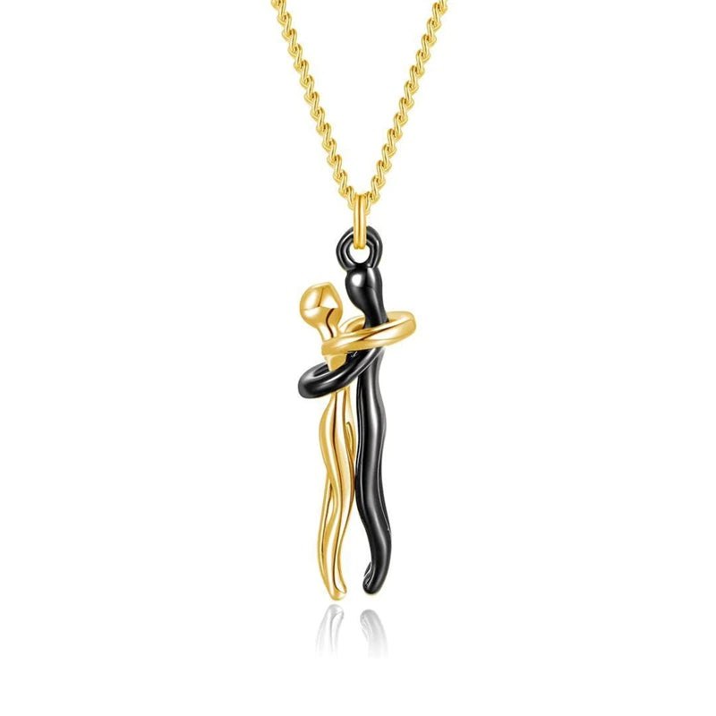 Hugging Pendant Necklace: pendant of two figures holding each other, on a fine chain